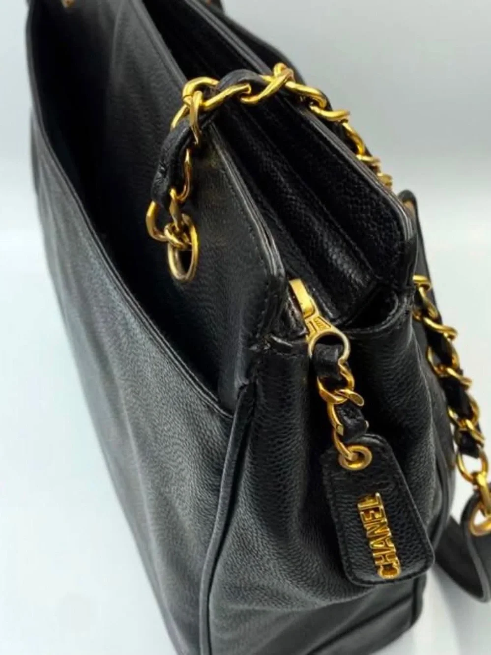CHANEL Black Leather Shoulder Bag with Gold Chain Straps